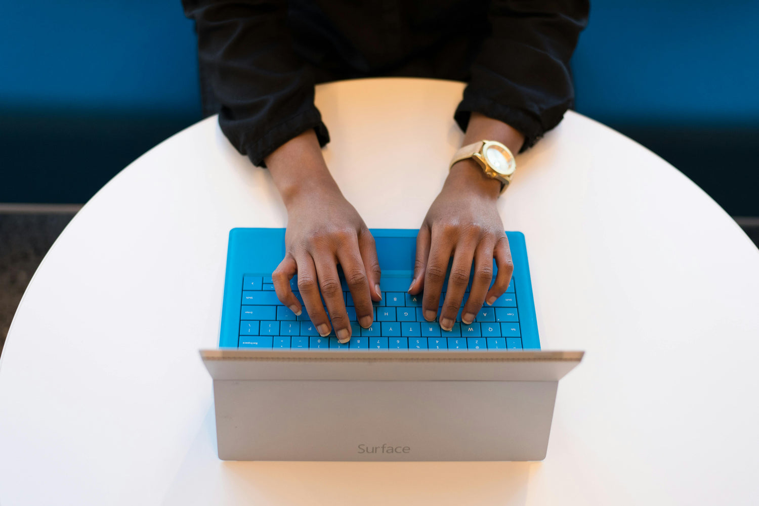Person typing on laptop 